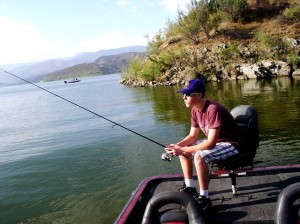 Tyler settles in for a long day of bass fishing.