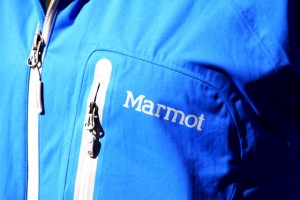 Marmot Hyper Jacket chest pocket and front zipper are water resistant, and worked fine.