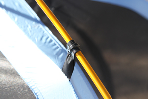 The tent easiy attaches to the two aluminum poles in minutes. 